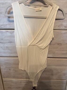 Women’s LA MIEL Cream Ribbed Bodysuit size small